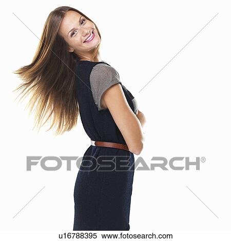 Portrait of pretty woman standing with hands folded and smiling View Large Photo Image Stock Photography - Portrait of pretty woman standing with hands folded and smiling. Fotosearch