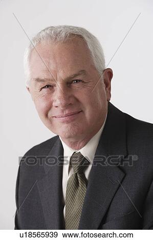 Portrait of senior businessman, studio shot View Large Photo Image Stock Photo - Portrait of senior businessman, studio shot. Fotosearch