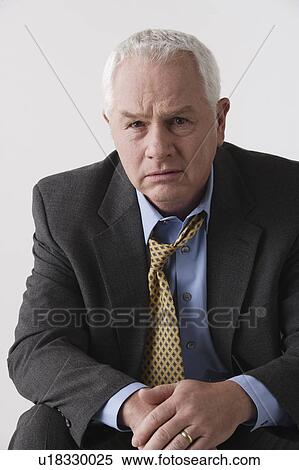 Portrait of senior businessman, studio shot View Large Photo Image Stock Photography - Portrait of senior businessman, studio shot. Fotosearch