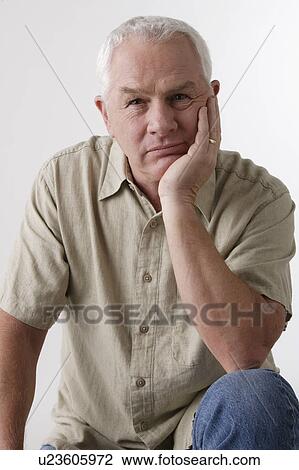 Portrait of senior man, studio shot View Large Photo Image Stock Image - Portrait of senior man, studio shot. Fotosearch
