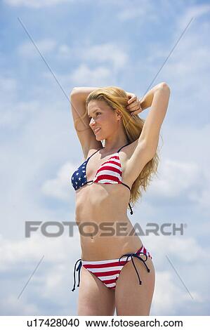 Portrait of woman in bikini View Large Photo Image Stock Image - Portrait of woman in bikini. Fotosearch