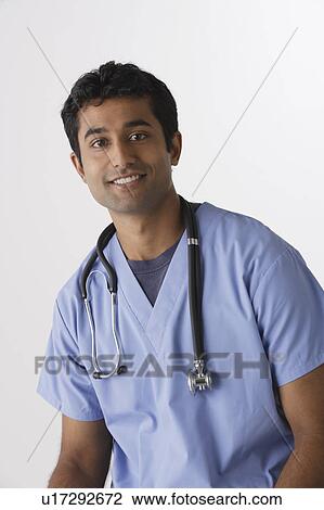 Portrait of young male nurse, studio shot View Large Photo Image Stock Image - Portrait of young male nurse, studio shot. Fotosearch