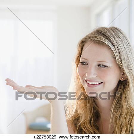 Portrait of young woman View Large Photo Image Stock Photo - Portrait of young woman. Fotosearch