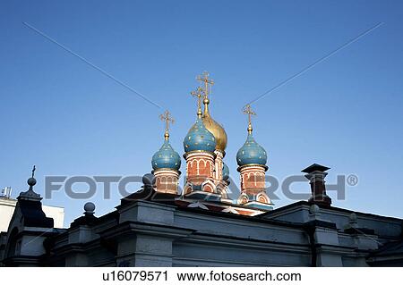 Stock Image - Russia, Moscow, Church domes against blue sky. Fotosearch