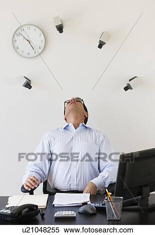 Security cameras watching office worker View Large Photo Image Stock Photography - Security cameras watching office worker. Fotosearch