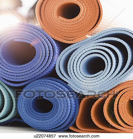Stock Photo - Stack of exercise mats. Fotosearch