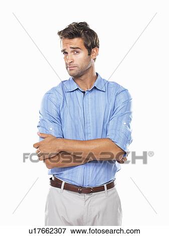 Studio portrait of young business man looking askance View Large Photo Image Stock Photo - Studio portrait of young business man looking askance. Fotosearch