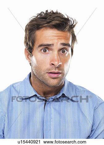 Studio portrait of young of shocked business man View Large Photo Image Stock Image - Studio portrait of young of shocked business man. Fotosearch