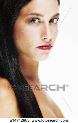 Studio portrait of young woman View Large Photo Image Stock Image - Studio portrait of young woman. Fotosearch