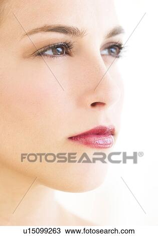 Studio portrait of young woman View Large Photo Image Stock Image - Studio portrait of young woman. Fotosearch