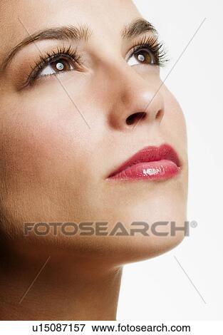 Studio portrait of young woman View Large Photo Image Stock Photo - Studio portrait of young woman. Fotosearch