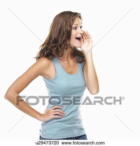 Studio shot of attractive young woman shouting View Large Photo Image Stock Image - Studio shot of attractive young woman shouting. Fotosearch