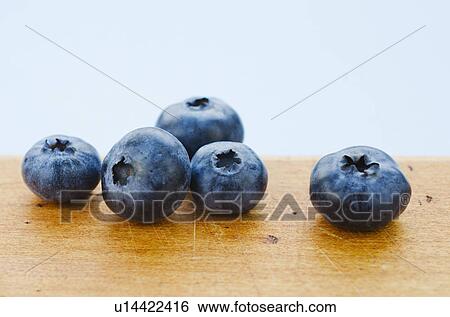 Stock Photograph - Studio shot of blueberries. Fotosearch