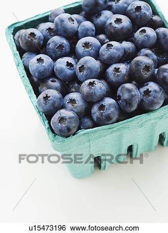 Stock Photograph - Studio shot of blueberries. Fotosearch