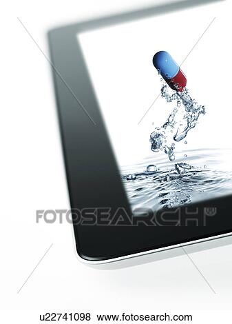 Studio shot of digital tablet with capsule View Large Photo Image Stock Photo - Studio shot of digital tablet with capsule. Fotosearch