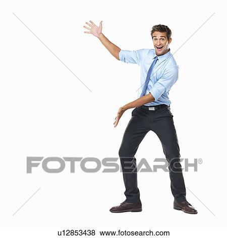 Studio shot of energetic business man giving presentation View Large Photo Image Stock Photo - Studio shot of energetic business man giving presentation. Fotosearch
