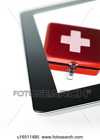 Stock Photography - Studio shot of first aid kit on digital tablet. Fotosearch
