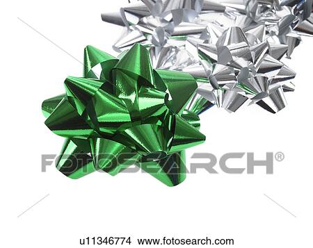 Studio shot of Gold Ribbon and Silver Ribbon on white background View Large Photo Image Picture - Studio shot of Gold Ribbon and Silver Ribbon on white background. Fotosearch
