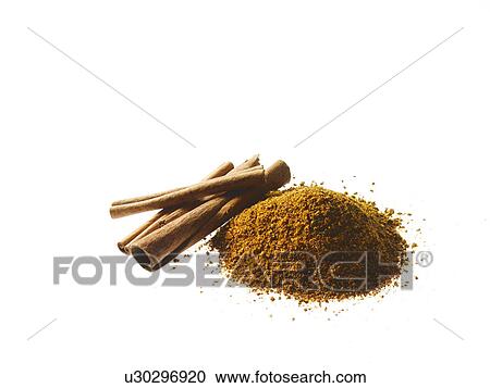Studio shot of Ground Cinnamon and Cinnamon Sticks on white background View Large Photo Image Stock Image - Studio shot of Ground Cinnamon and Cinnamon Sticks on white background. Fotosearch