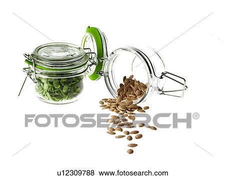 Stock Photo - Studio shot of jars with Mixed Seeds on white background. Fotosearch