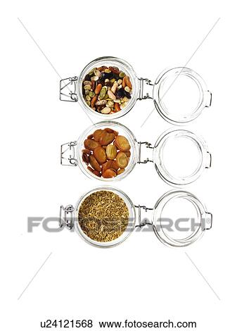 Studio shot of jars with Mixed Seeds on white background View Large Photo Image Stock Photo - Studio shot of jars with Mixed Seeds on white background. Fotosearch
