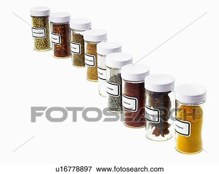 Studio shot of Jars with spices on white background View Large Photo Image Stock Photo - Studio shot of Jars with spices on white background. Fotosearch