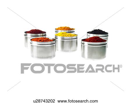 Stock Image - Studio shot of jars with spices. Fotosearch