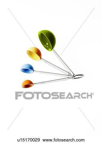 Studio shot of multicolored measuring spoons View Large Photo Image Stock Photo - Studio shot of multicolored measuring spoons. Fotosearch