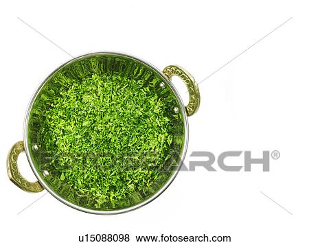 Studio shot of Parsley Flakes in pan on white background View Large Photo Image Stock Photo - Studio shot of Parsley Flakes in pan on white background. Fotosearch