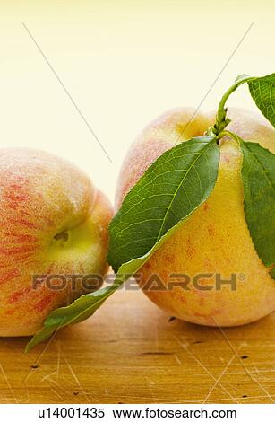 Studio shot of peaches View Large Photo Image Stock Photography - Studio shot of peaches. Fotosearch
