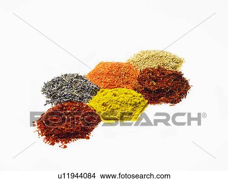 Studio shot of Piles of spice on white background View Large Photo Image Picture - Studio shot of Piles of spice on white background. Fotosearch
