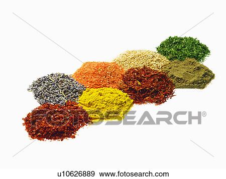 Stock Photo - Studio shot of Piles of spice on white background. Fotosearch