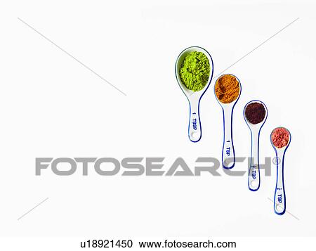 Studio shot of piles of spices on measuring spoons View Large Photo Image Stock Image - Studio shot of piles of spices on measuring spoons. Fotosearch