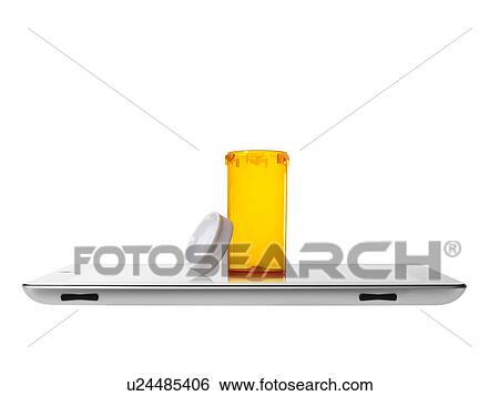 Studio shot of pill bottle on digital tablet View Large Photo Image Stock Photograph - Studio shot of pill bottle on digital tablet. Fotosearch