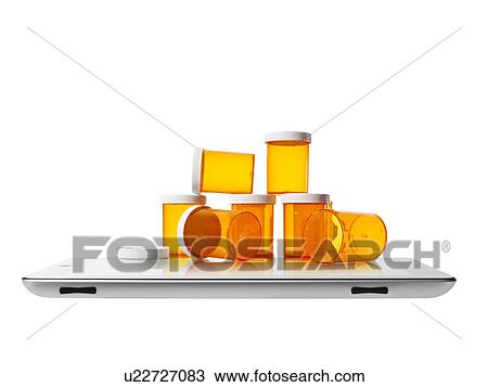 Studio shot of pill bottles on digital tablet View Large Photo Image Stock Image - Studio shot of pill bottles on digital tablet. Fotosearch