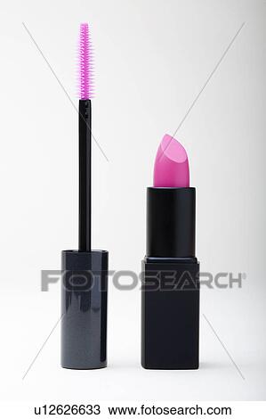 Stock Image - Studio shot of pink lipstick and mascara. Fotosearch
