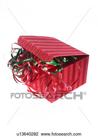 Studio shot of Red and Green Ribbon and Red Box on white background View Large Photo Image Stock Image - Studio shot of Red and Green Ribbon and Red Box on white background. Fotosearch