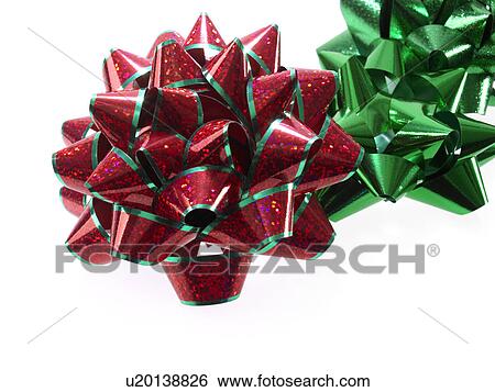 Stock Photograph - Studio shot of Red and Green Ribbon on white background. Fotosearch