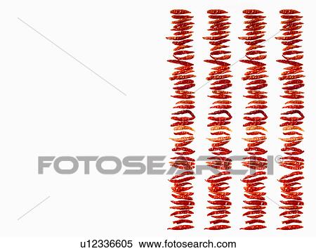 Stock Photography - Studio shot of Red Chili Peppers on white background. Fotosearch