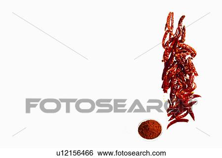 Stock Photograph - Studio shot of red chili peppers. Fotosearch
