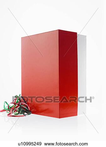 Stock Photo - Studio shot of red Christmas presents with ribbons. Fotosearch