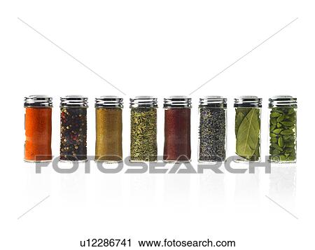 Studio shot of row of jars with spices View Large Photo Image Stock Image - Studio shot of row of jars with spices. Fotosearch