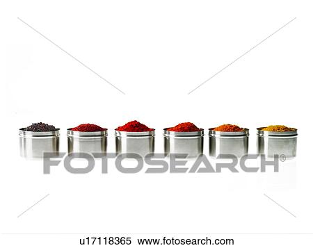 Stock Photography - Studio shot of row of jars with spices. Fotosearch