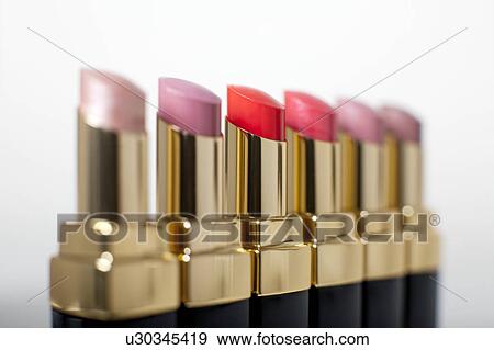 Studio shot of row of lipsticks View Large Photo Image Stock Photo - Studio shot of row of lipsticks. Fotosearch