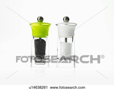 Stock Image - Studio shot of salt and pepper grinders. Fotosearch