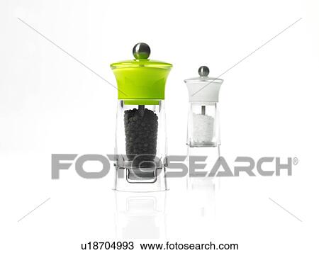 Stock Image - Studio shot of salt and pepper grinders. Fotosearch