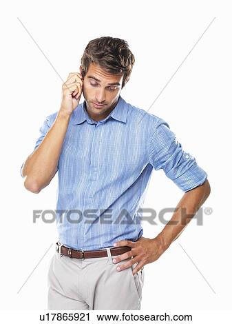 Studio shot of thoughtful business man holding his earlobe View Large Photo Image Stock Image - Studio shot of thoughtful business man holding his earlobe. Fotosearch