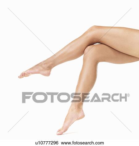 Studio shot of woman's barefoot legs View Large Photo Image Stock Photograph - Studio shot of woman's barefoot legs. Fotosearch