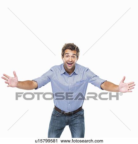 Studio shot of young cheerful man with arms outstretched View Large Photo Image Stock Image - Studio shot of young cheerful man with arms outstretched. Fotosearch