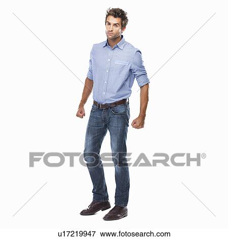 Studio shot of young man ready to fight standing on white background View Large Photo Image Stock Photo - Studio shot of young man ready to fight standing on white background. Fotosearch